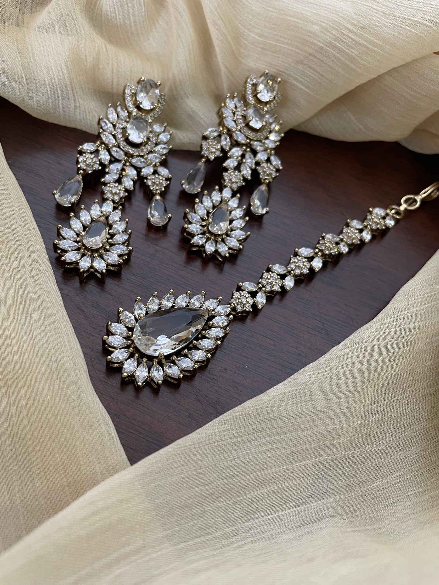 Premium Statement Ad Earring & Tikka Set - WHITE
(Antique Gold Base)
