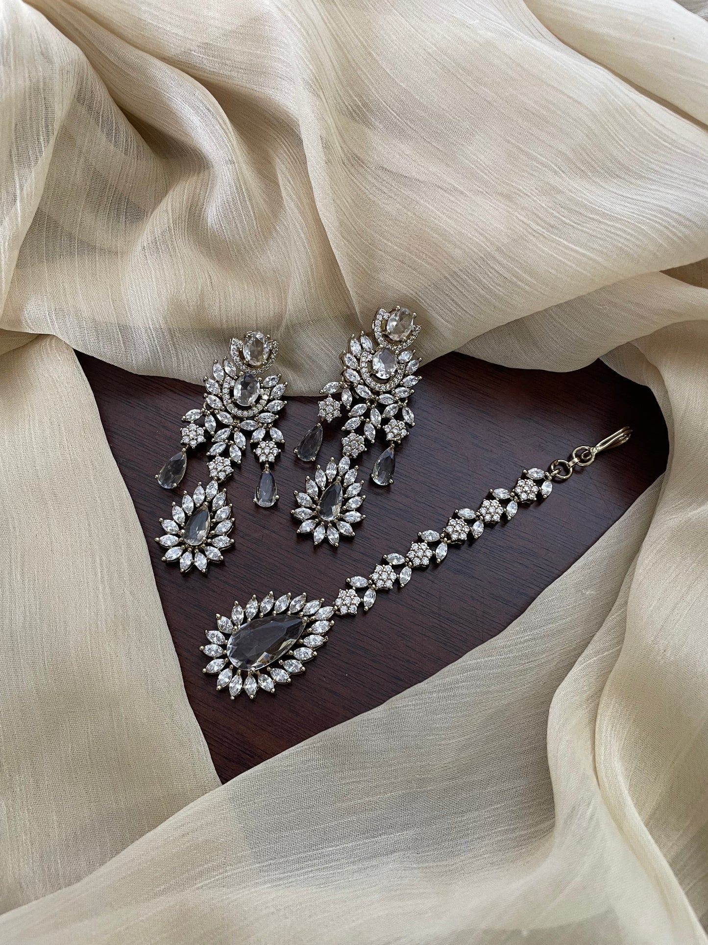 Premium Statement Ad Earring & Tikka Set - WHITE
(Antique Gold Base)