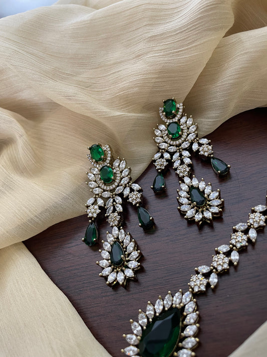 Premium Statement Ad Earring & Tikka Set - GREEN
(Antique Gold Base)