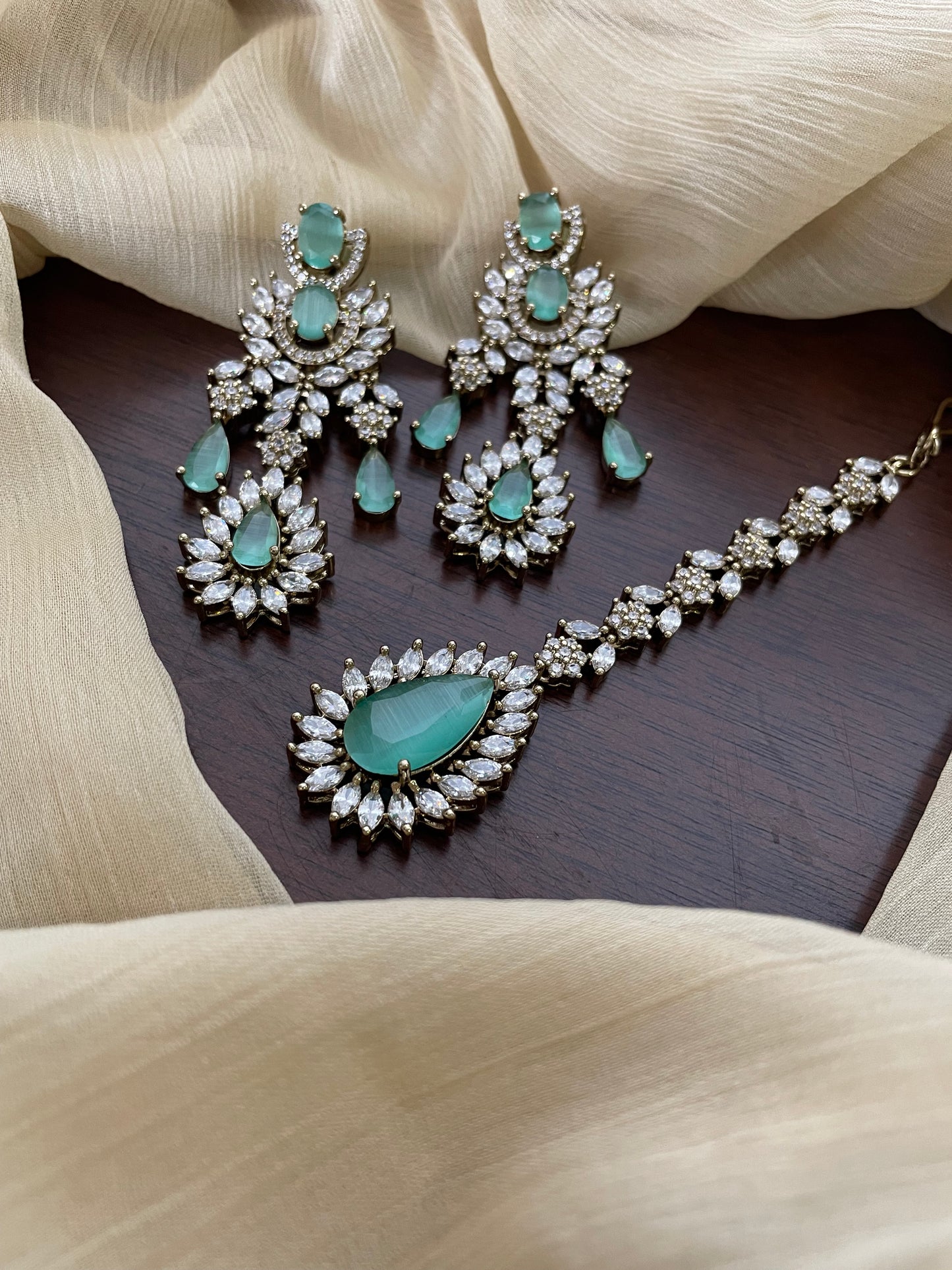 Premium Statement Ad Earring & Tikka Set - MINT
(Antique Gold Base)