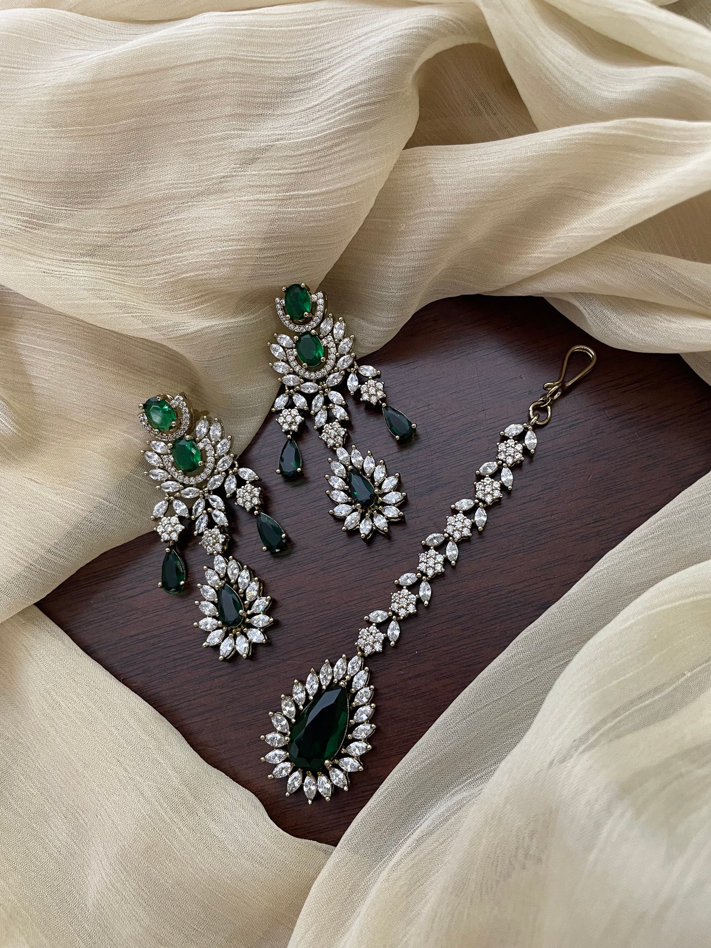 Premium Statement Ad Earring & Tikka Set - GREEN
(Antique Gold Base)