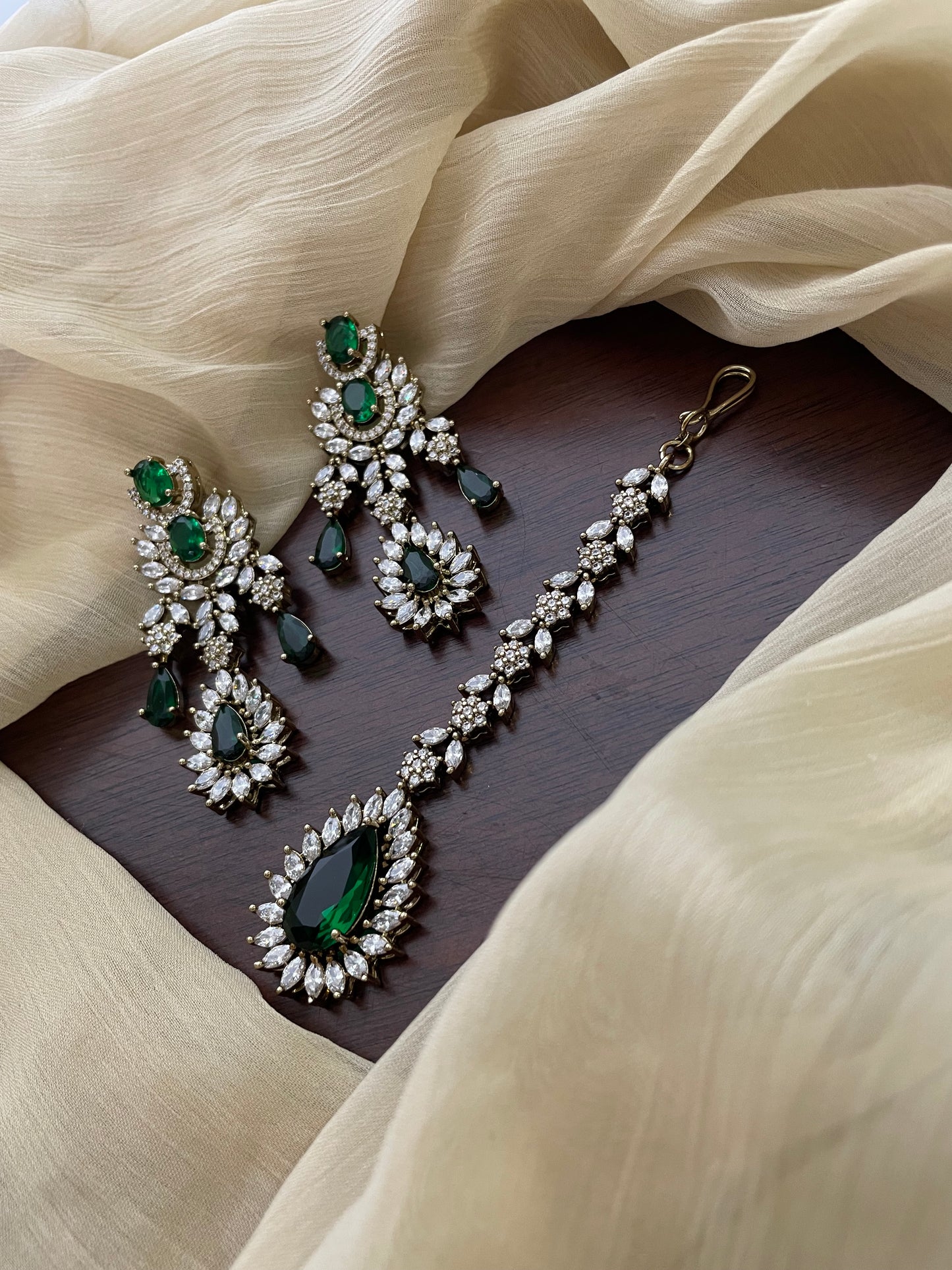 Premium Statement Ad Earring & Tikka Set - GREEN
(Antique Gold Base)